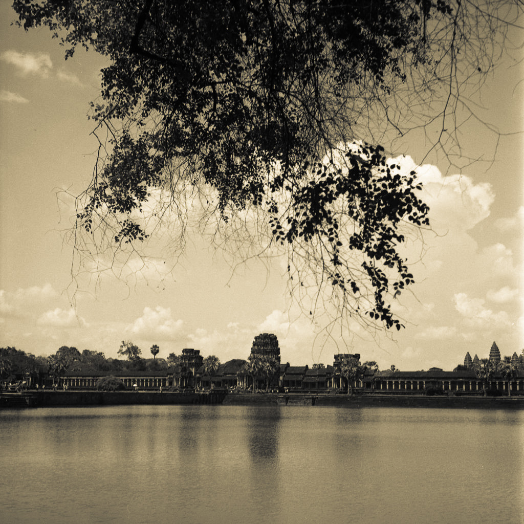 Photograph Angkor Wat Cambodia — panoramic view temple towers sunrise reflection fine art documentary photography